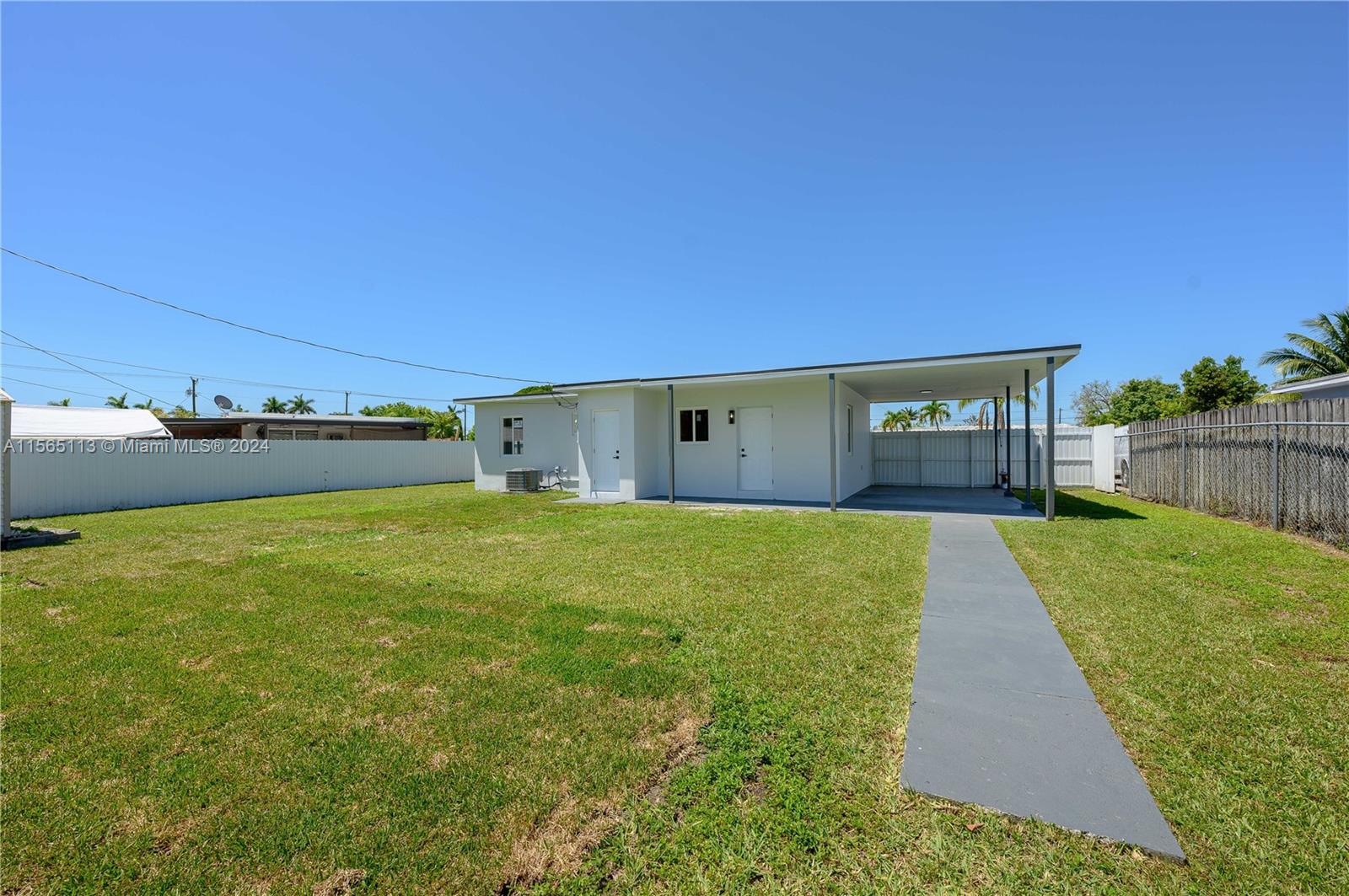 29451 Maine Road Homestead, FL 33033 - Photo 7 of 22 a view of outdoor space and yard