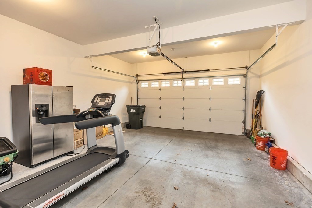 95-1 Lowell Road, Unit 1 Pepperell, MA 01463 - Photo 31 of 36 a view of a room with gym equipment