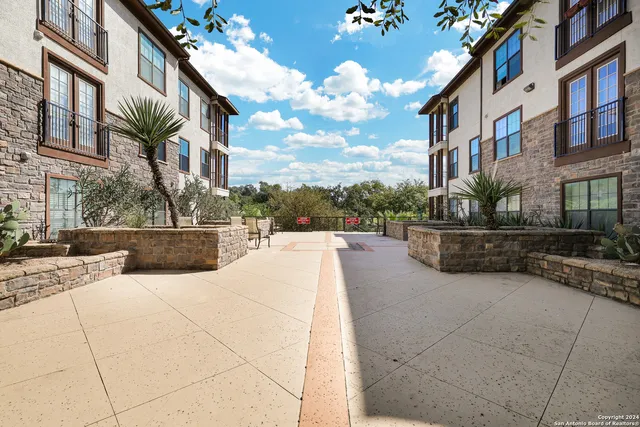 a view of parking space with parked cars