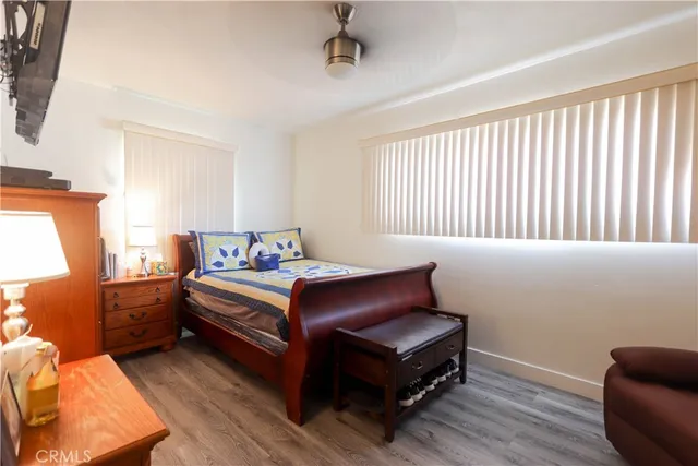 a room with furniture and wooden floor