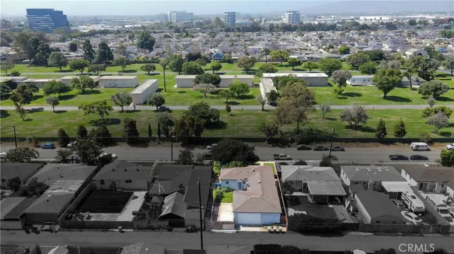 an aerial view of a city with lots of residential buildings