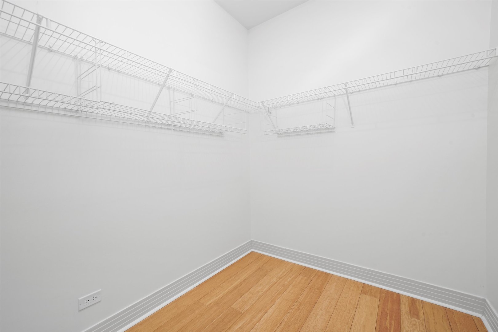 1055 West Monroe Street, Unit A Chicago, IL 60607 - Photo 16 of 28 a view of a room with racks on the wall