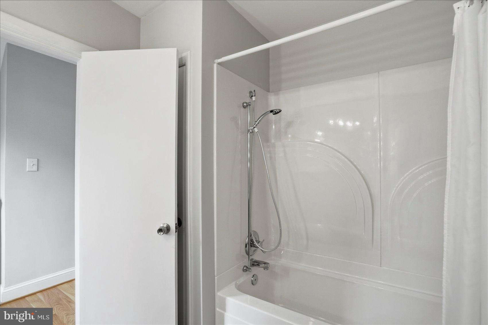 24 Normal Terrace Baltimore, MD 21286 - Photo 35 of 37 a bathroom with a bathtub and a shower