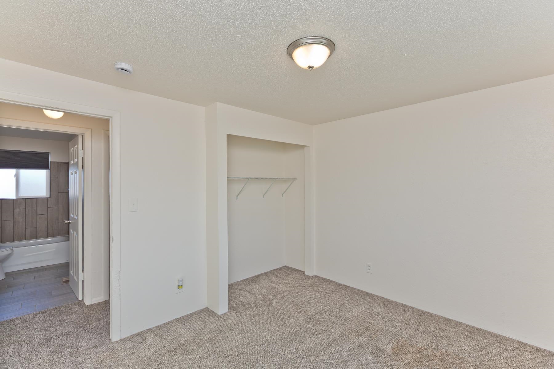 3212 D D 1/4 Road Clifton, CO 81520 - Photo 8 of 25 an empty room with closet area