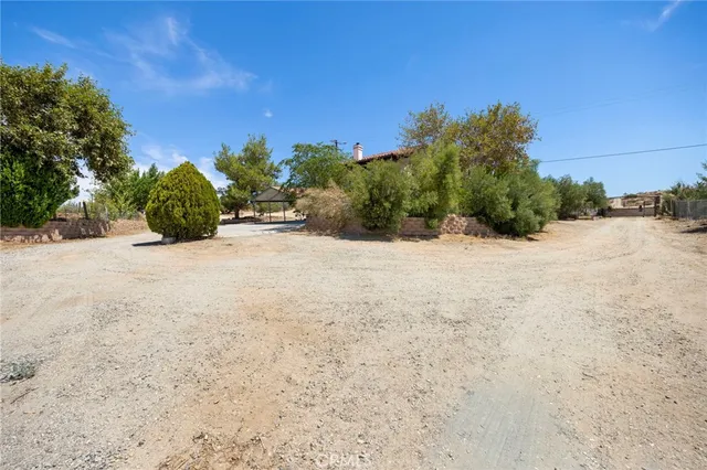 a view of backyard with outdoor space
