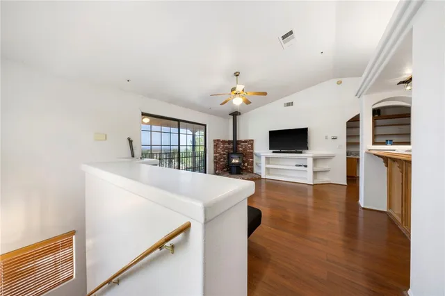 a view of living room with furniture and flat screen tv