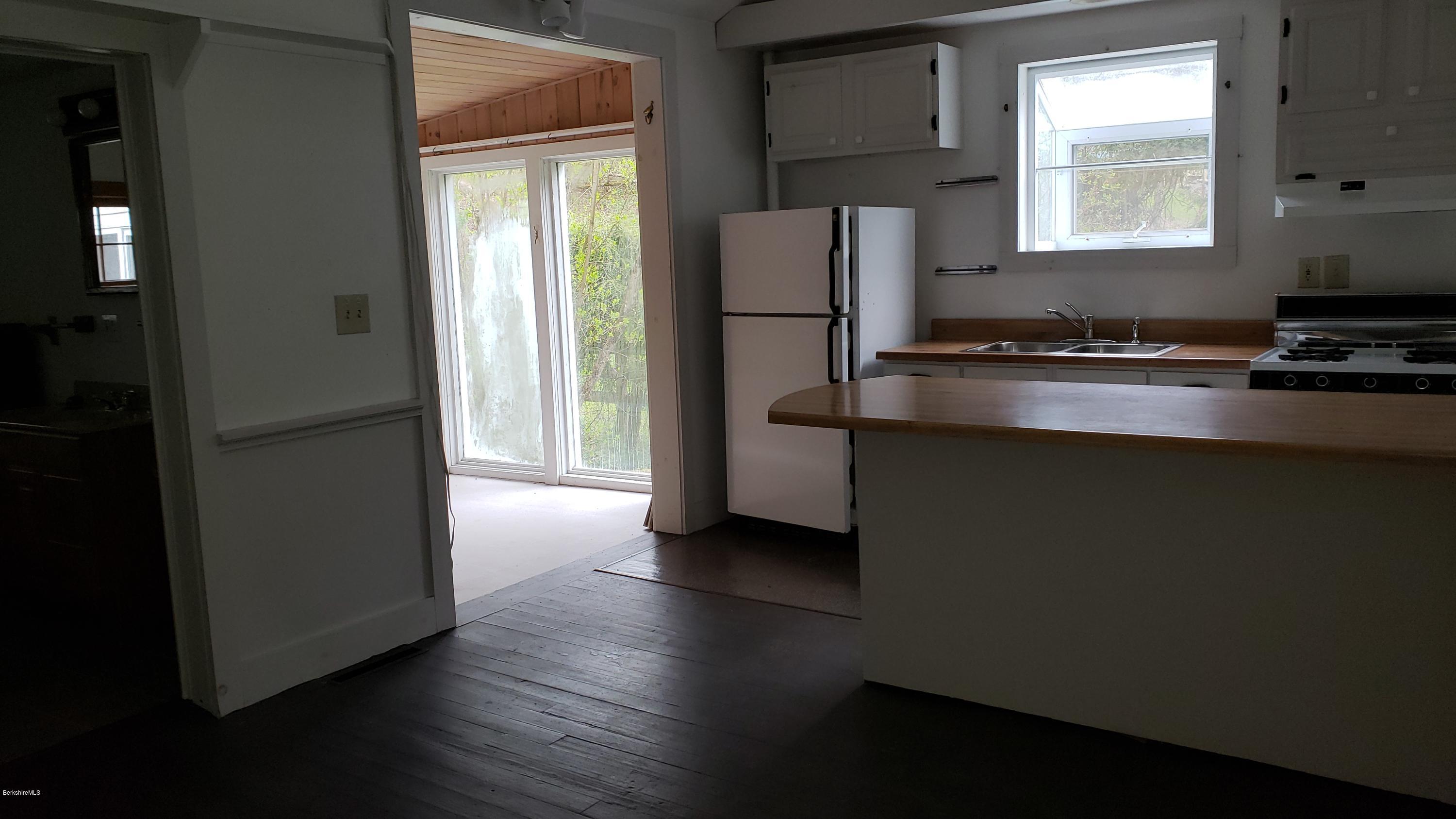 518 Cold Spring Road Williamstown, MA 01267 - Photo 18 of 42 Kitchen into sunroom & bath
