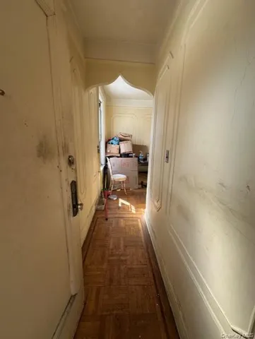 a view of a hallway with a couch