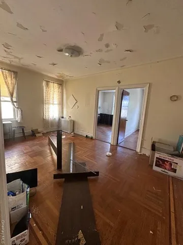 a view of a living room and dining room