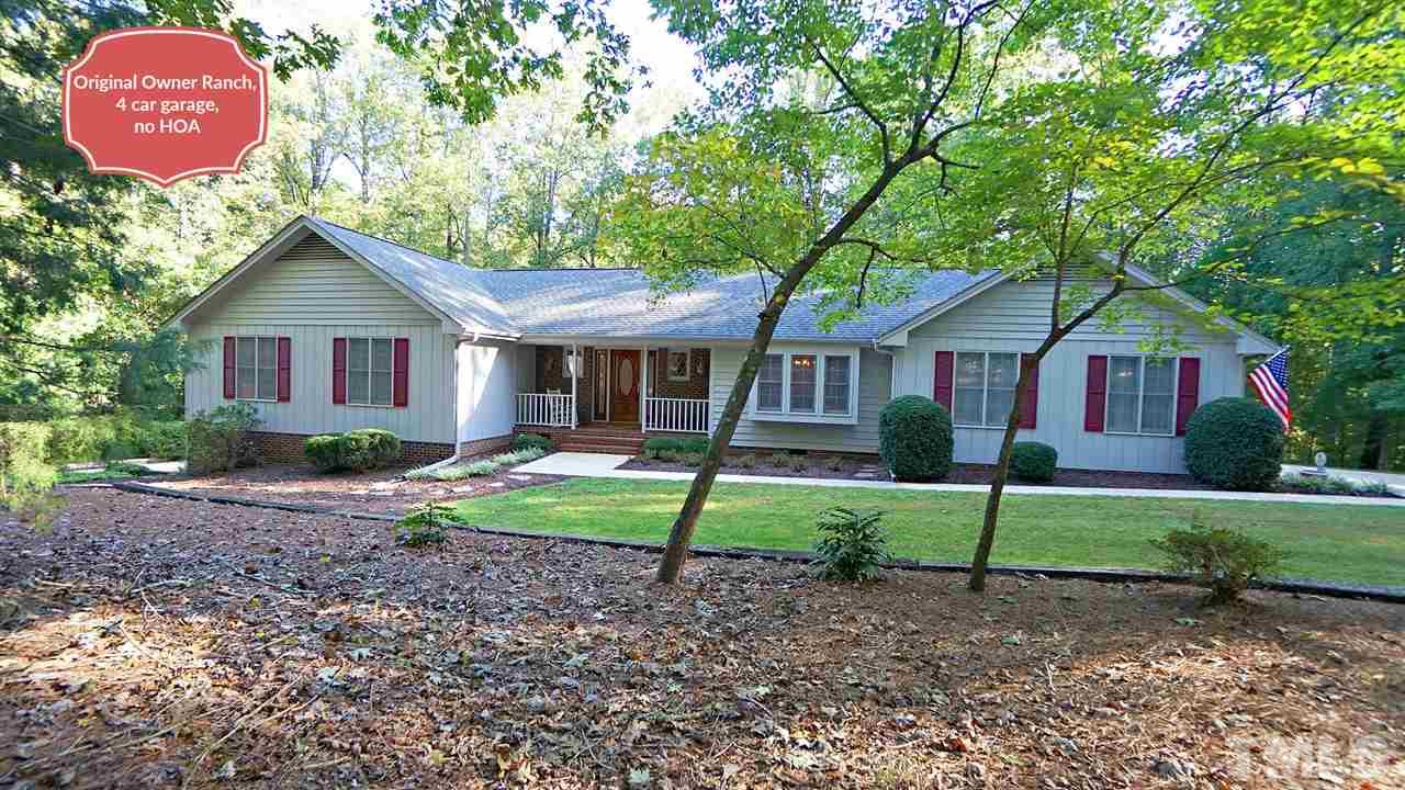5113 Forest Creek Road Raleigh, NC 27606 - Photo 1 of 30 Beautiful private ranch. Main level living set back in natural area w/ tasteful landscaping