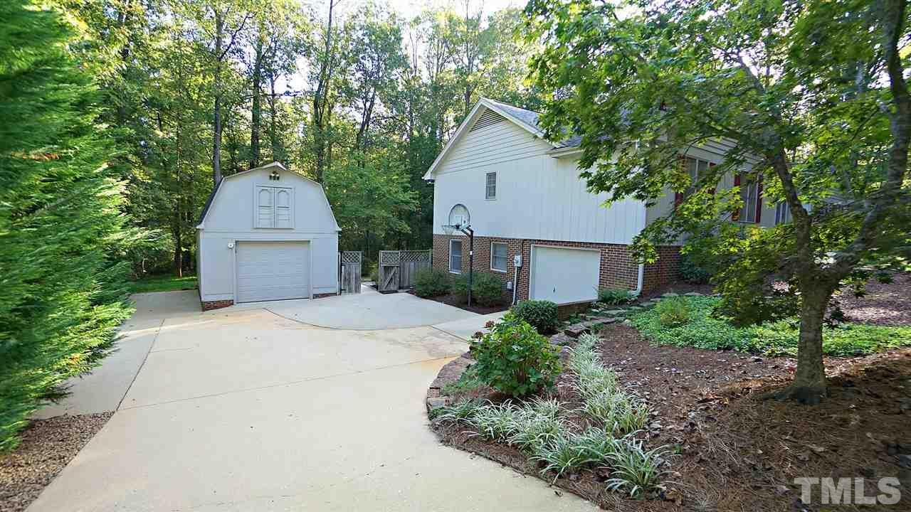 5113 Forest Creek Road Raleigh, NC 27606 - Photo 23 of 30 Private 3rd car garage w/ access to basement in-law suite.