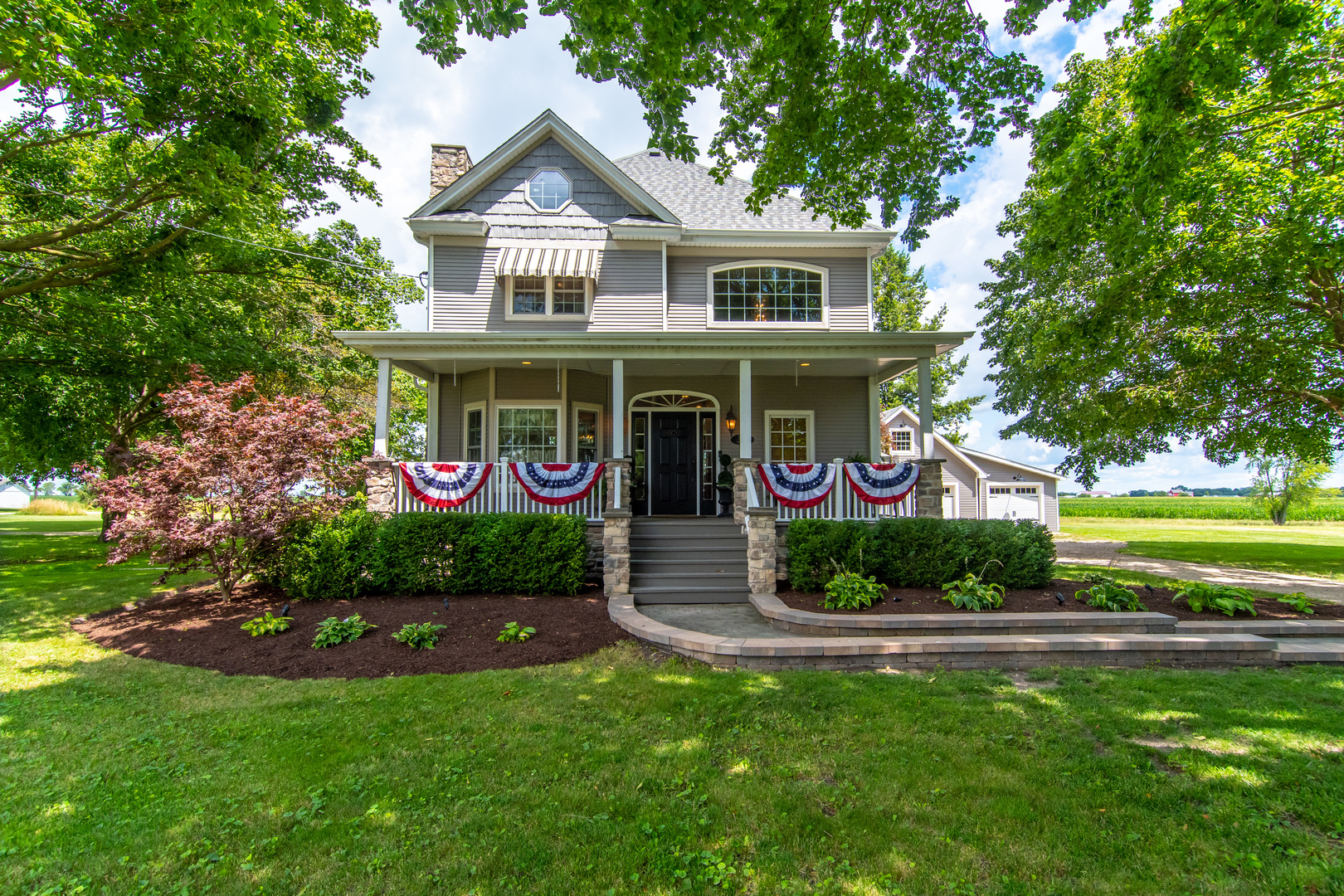 7961 Chicago Road Minooka, IL 60447 - Photo 1 of 63 a front view of a house with garden