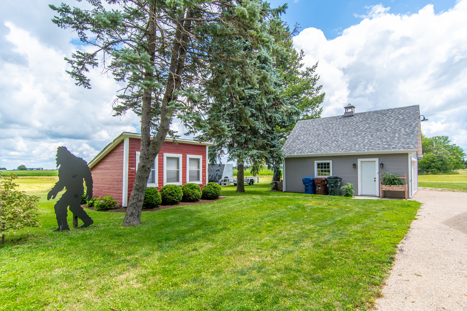 7961 Chicago Road Minooka, IL 60447 - Photo 14 of 63 a view of a yard in front of a house
