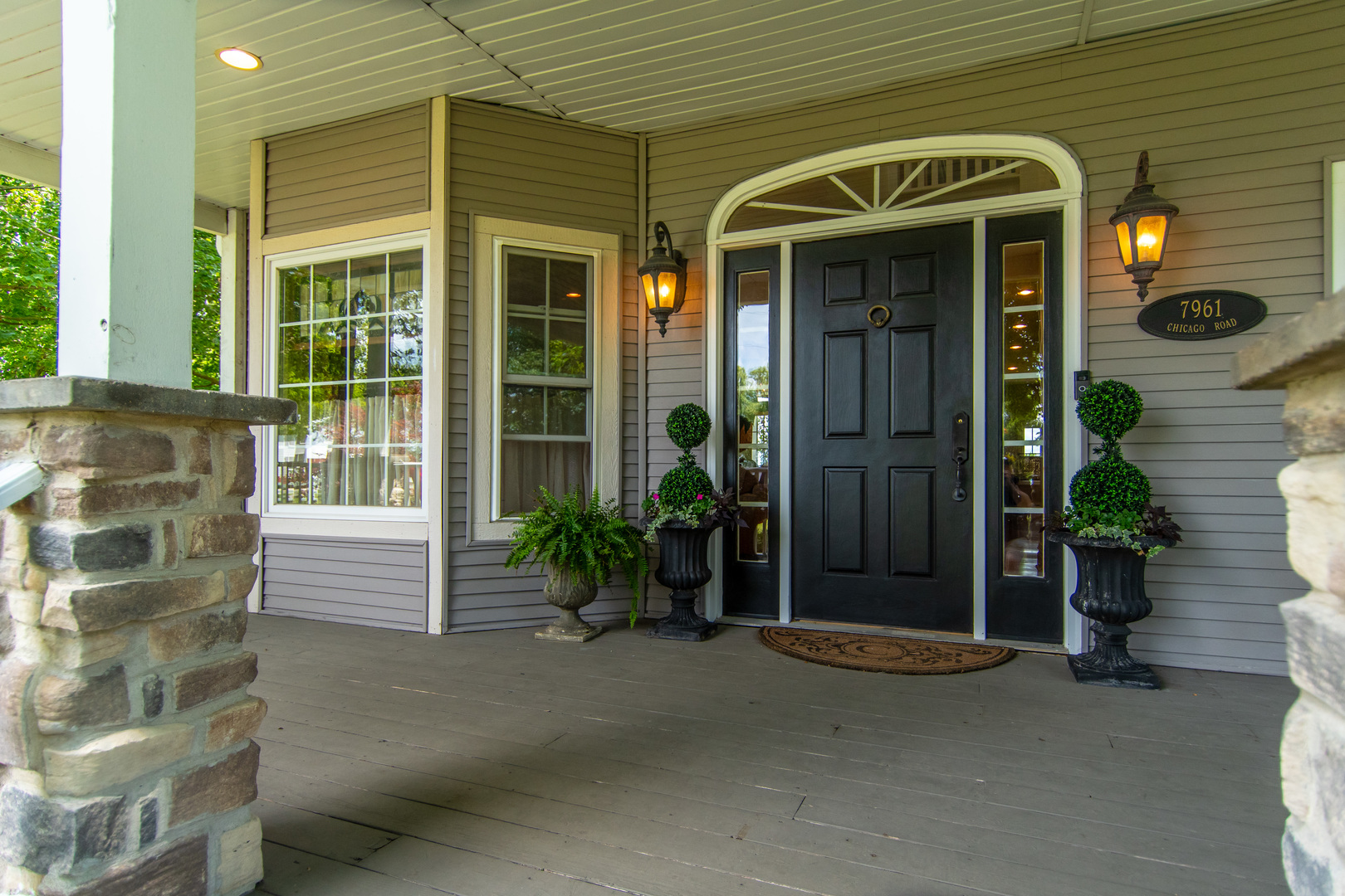 7961 Chicago Road Minooka, IL 60447 - Photo 25 of 63 a front view of a house with a plants