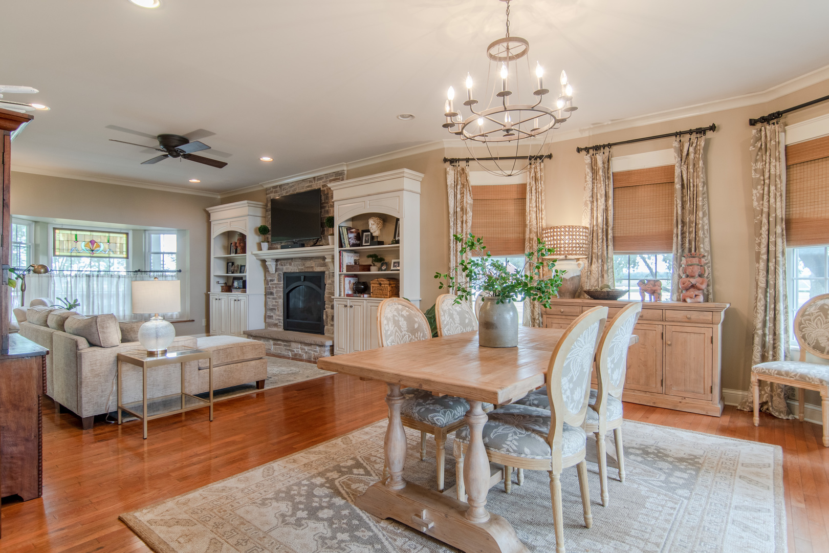 7961 Chicago Road Minooka, IL 60447 - Photo 32 of 63 a view of a dining room with furniture a chandelier and wooden floor