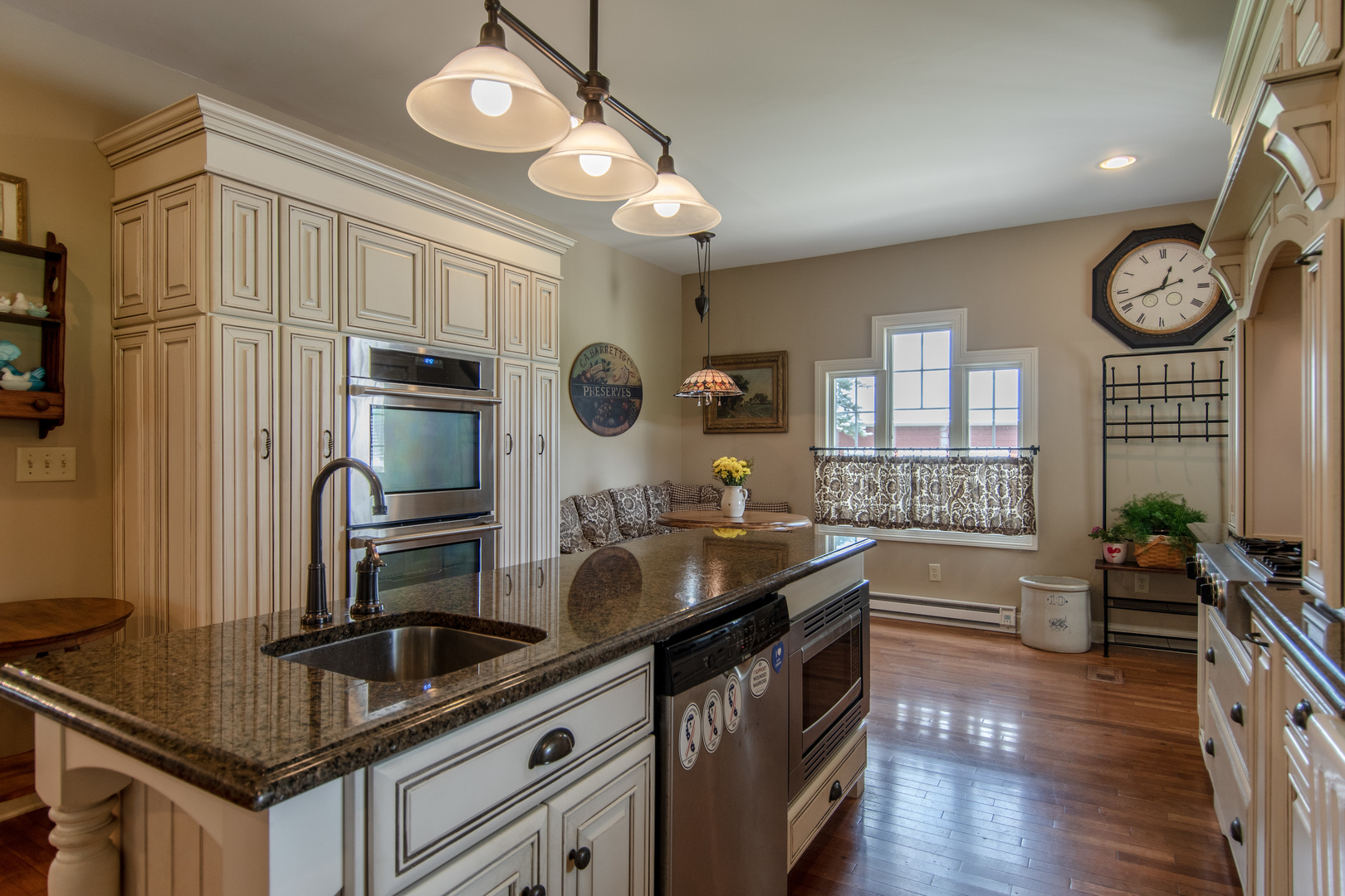 7961 Chicago Road Minooka, IL 60447 - Photo 40 of 63 a kitchen with granite countertop a stove and a sink