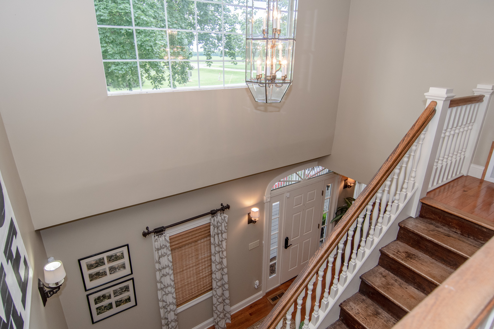 7961 Chicago Road Minooka, IL 60447 - Photo 46 of 63 a view of staircase with wooden floor and white walls