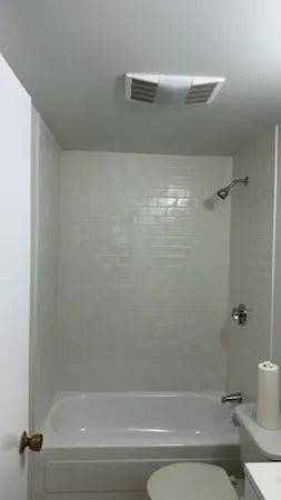 a bathroom with a sink and mirror