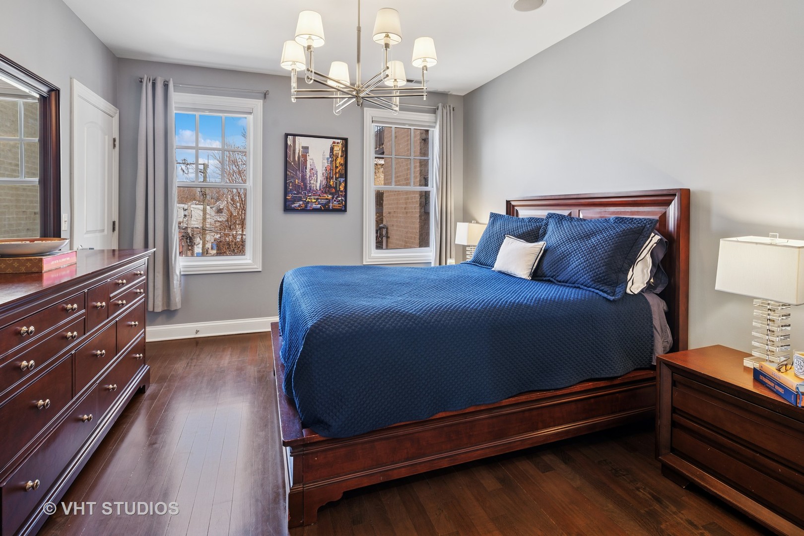 1608 West Grace Street Chicago, IL 60613 - Photo 11 of 25 a bed room with a bed and a dresser
