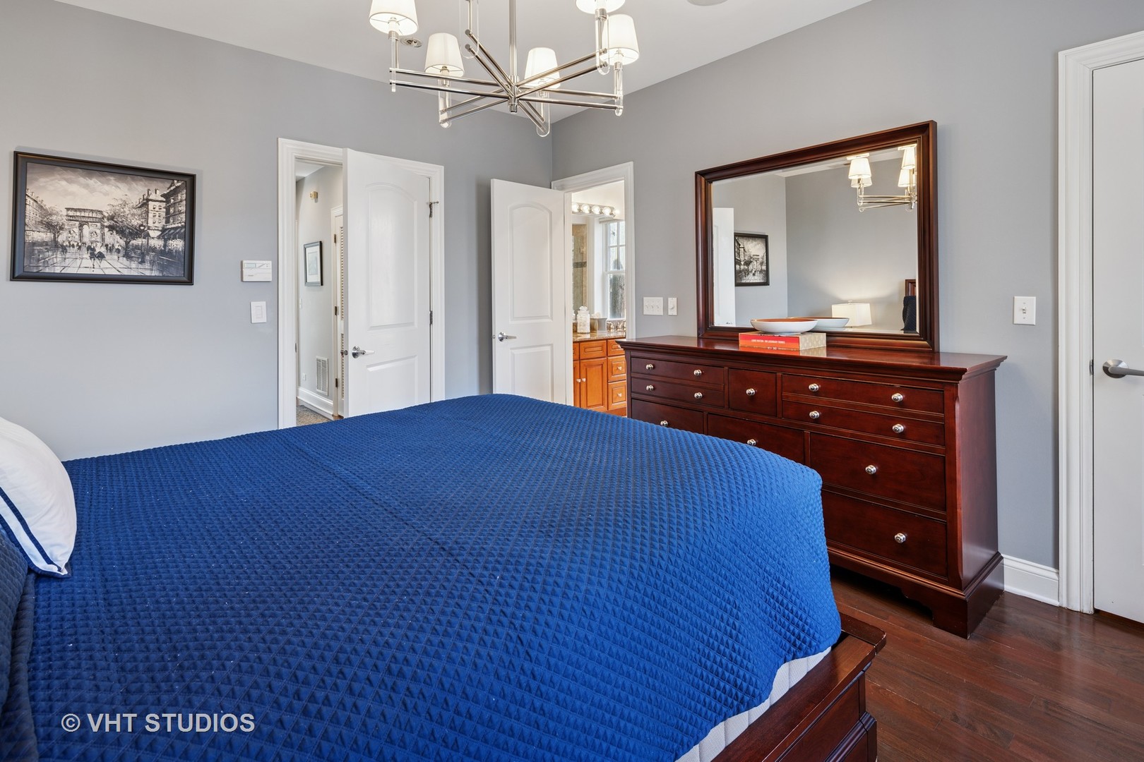 1608 West Grace Street Chicago, IL 60613 - Photo 12 of 25 a bedroom with a bed and a dresser