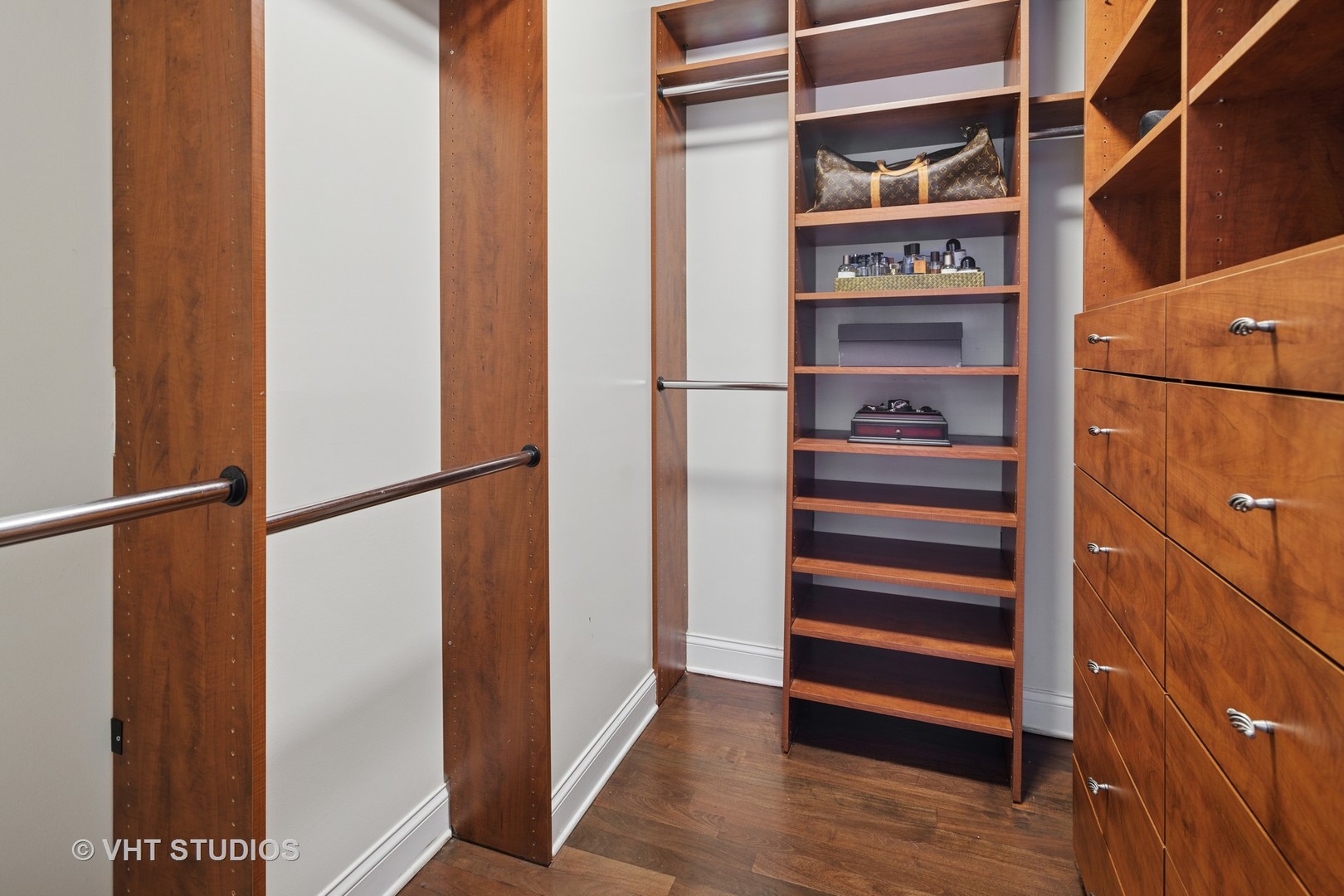 1608 West Grace Street Chicago, IL 60613 - Photo 13 of 25 a view of walk in closet with empty racks