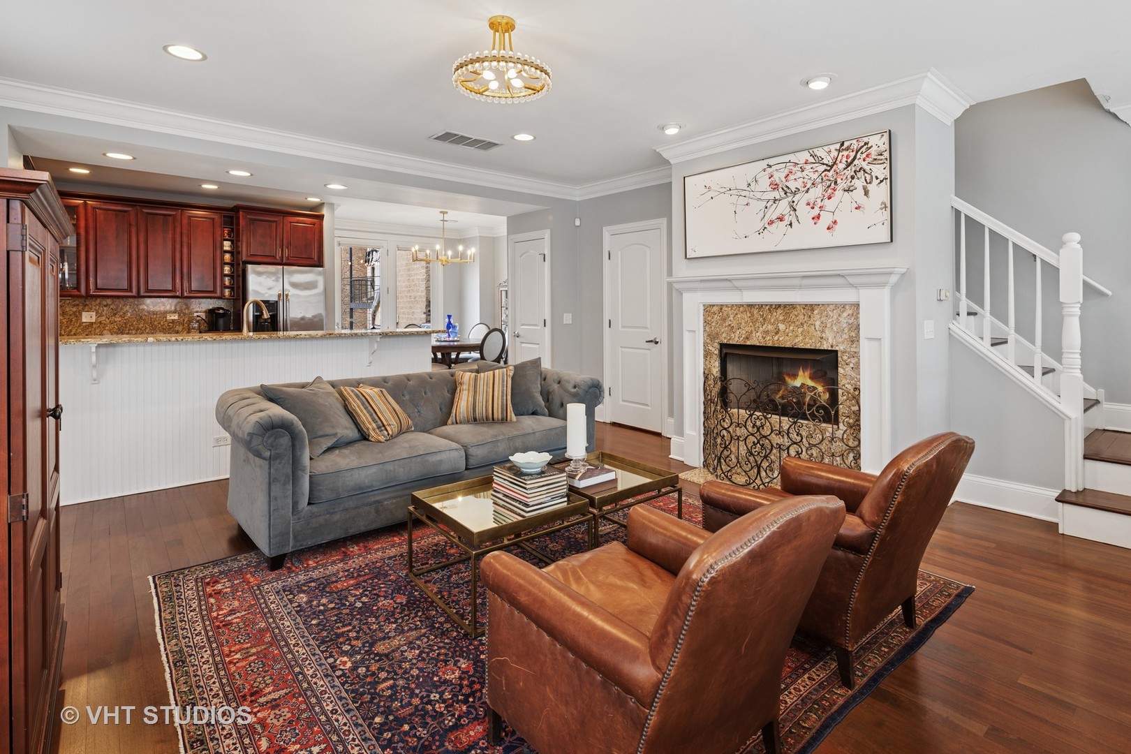 1608 West Grace Street Chicago, IL 60613 - Photo 2 of 25 a living room with furniture and a fireplace