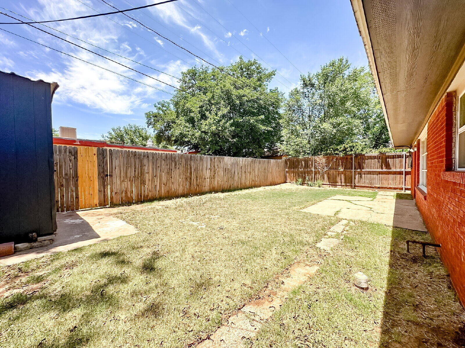 2608 Raleigh Avenue Lubbock, TX 79410 - Photo 23 of 23 a backyard of a house