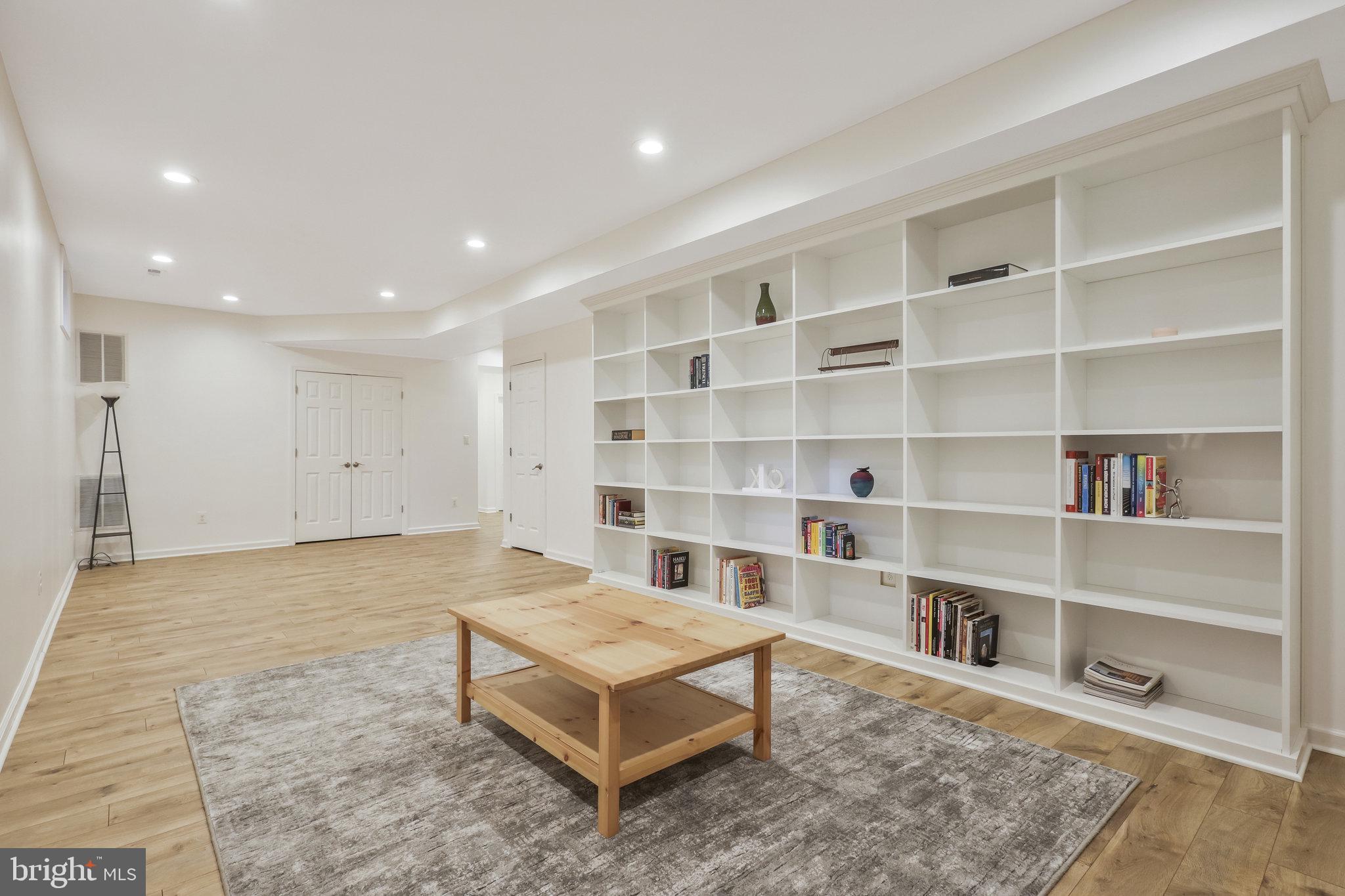 7715 Ridgepark Court Springfield, VA 22153 - Photo 52 of 69 Rec Room with Built-in Shelves