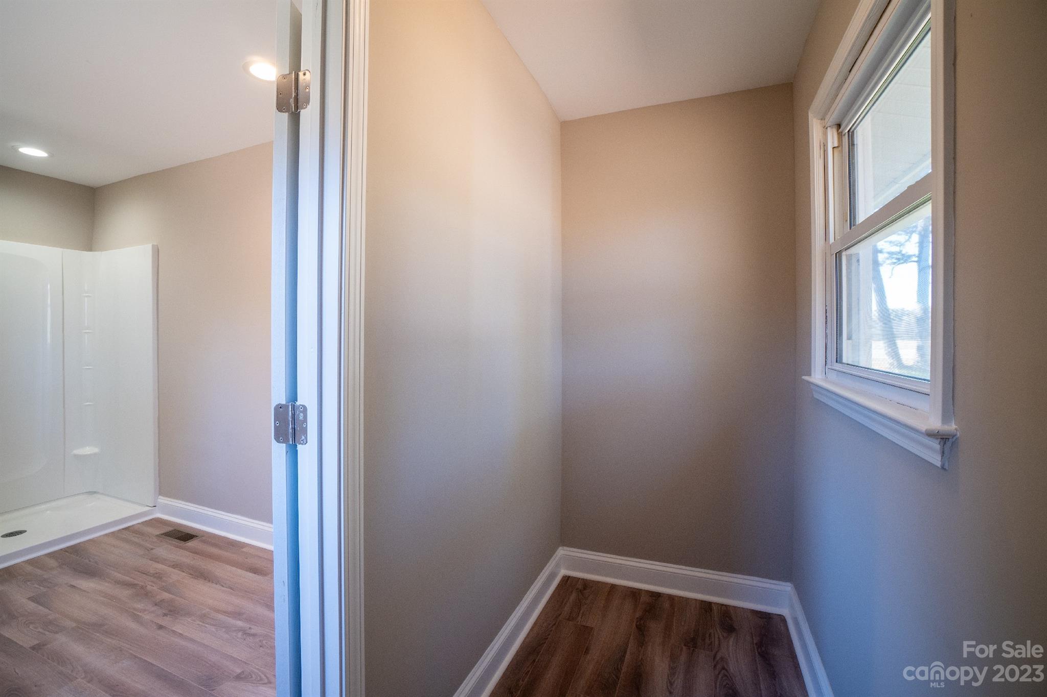 446 Rash Road Olin, NC 28660 - Photo 31 of 35 a view of small space with wooden floor and windows