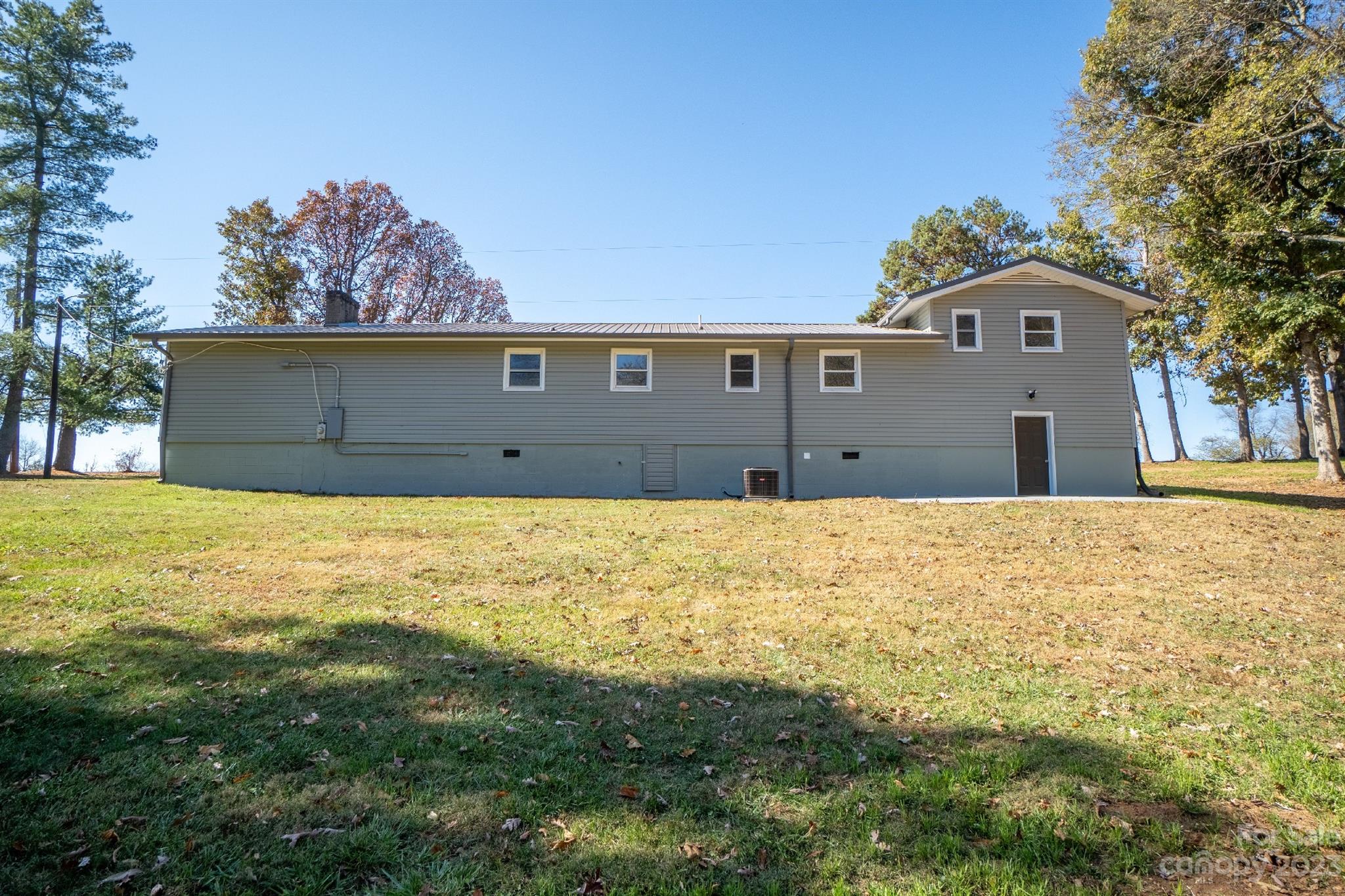 446 Rash Road Olin, NC 28660 - Photo 4 of 35 a front view of house with yard and garage