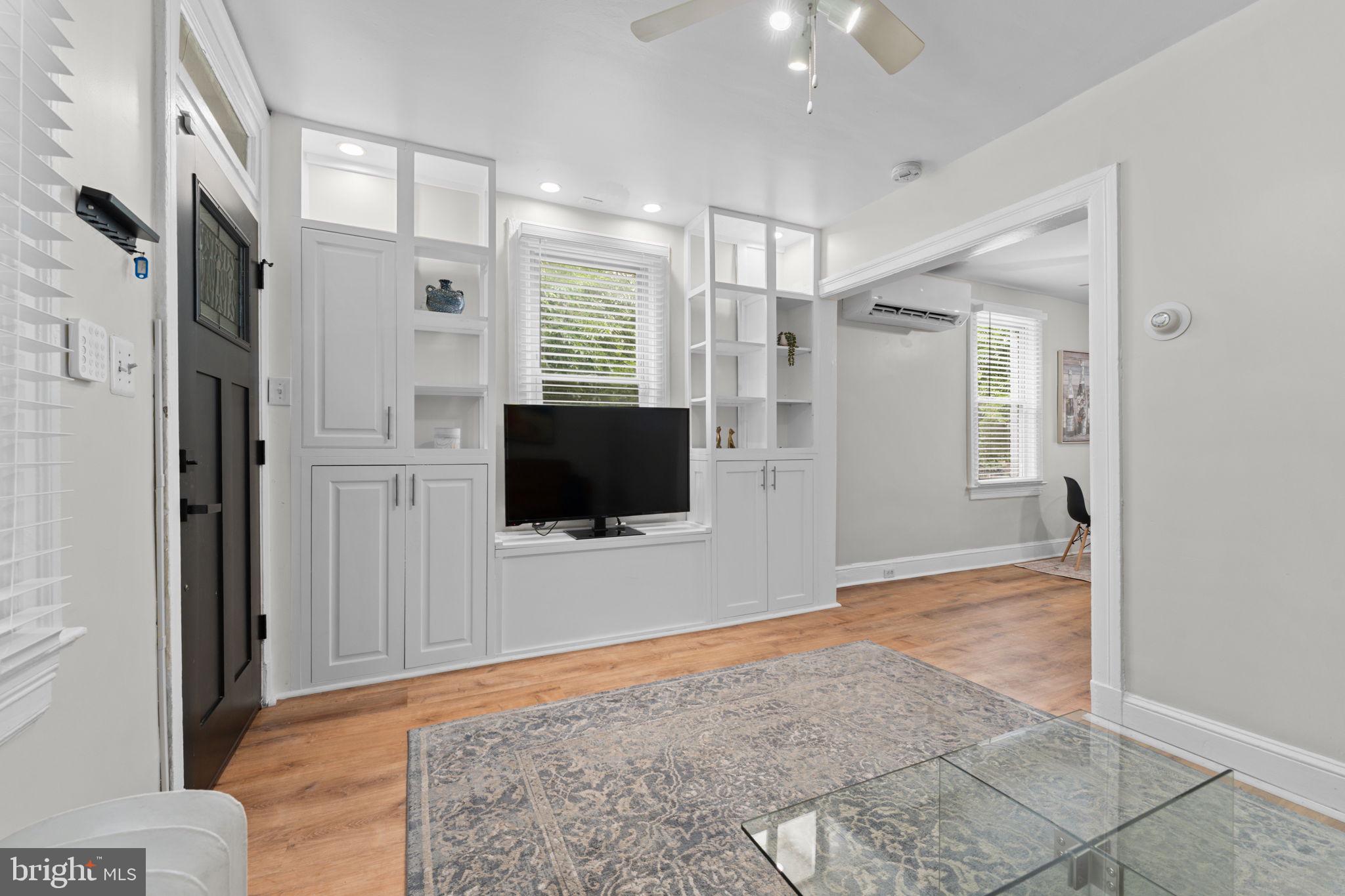 2339 3rd Street Northeast Washington, DC 20002 - Photo 9 of 59 Living room boasts built-in open cabinetry