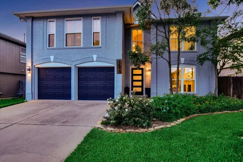 a front view of a house having yard