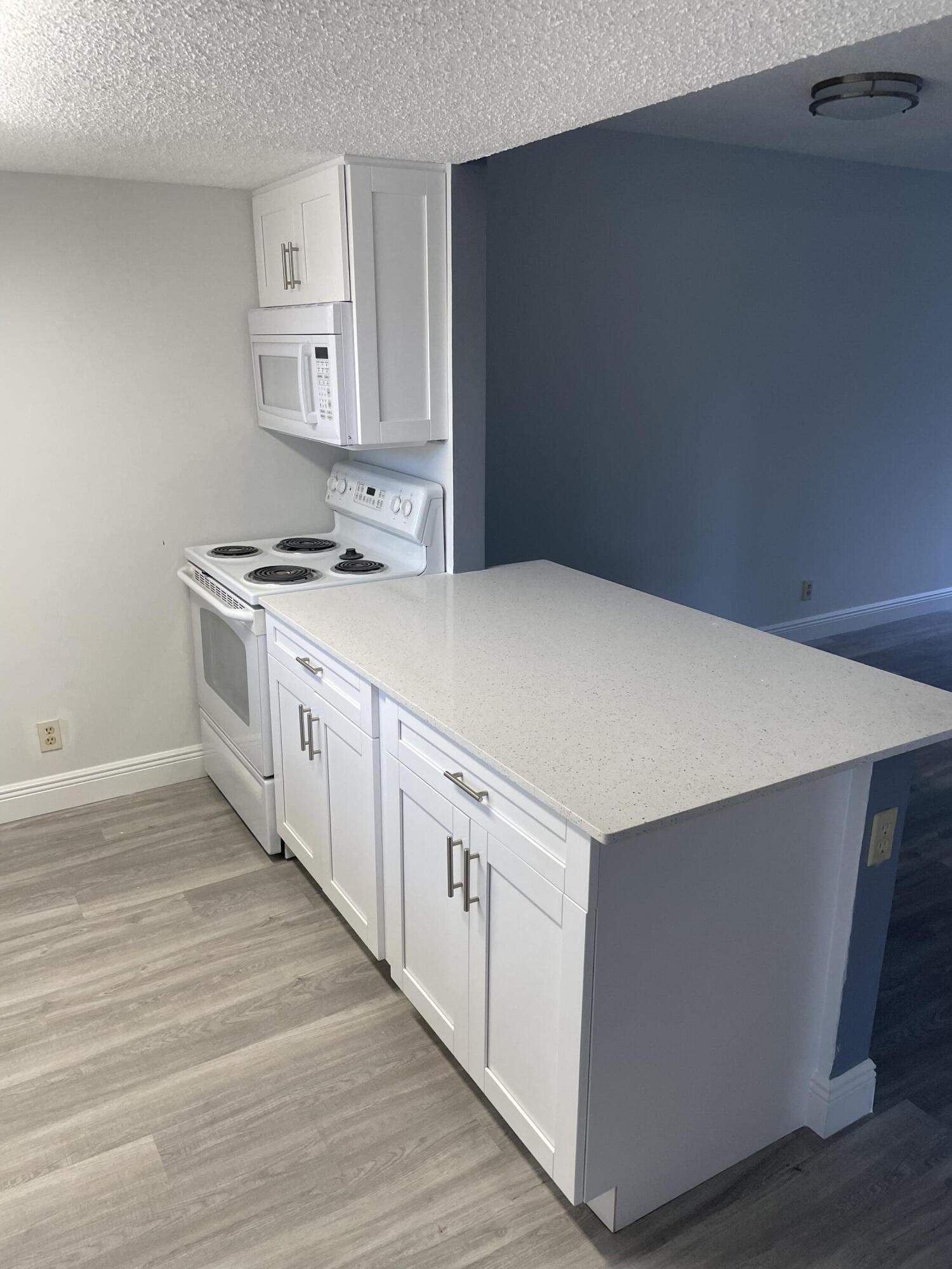 6284 La Costa Drive, Unit H Boca Raton, FL 33433 - Photo 1 of 3 IMG_4439