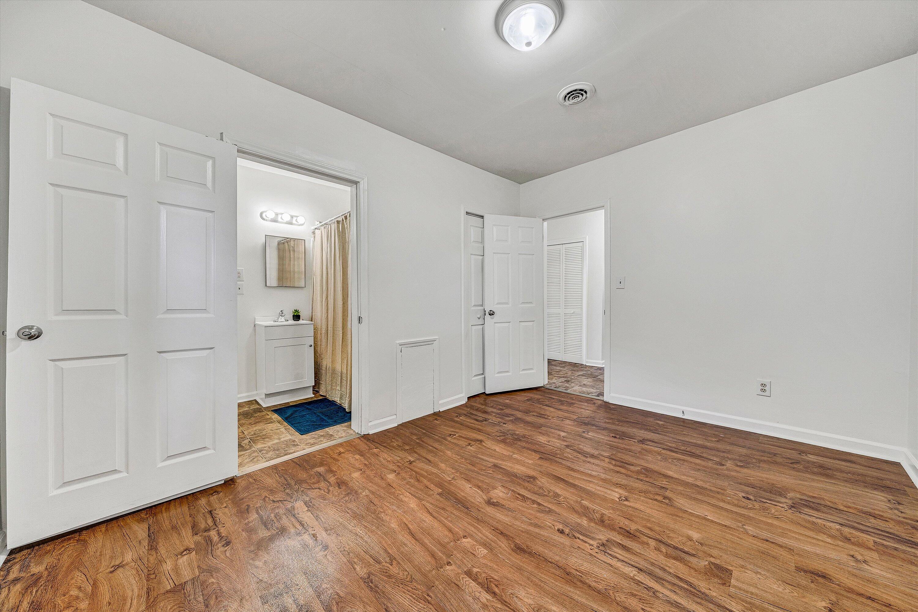 115 Liberty Road Northeast Roanoke, VA 24012 - Photo 15 of 24 a view of a livingroom with wooden floor