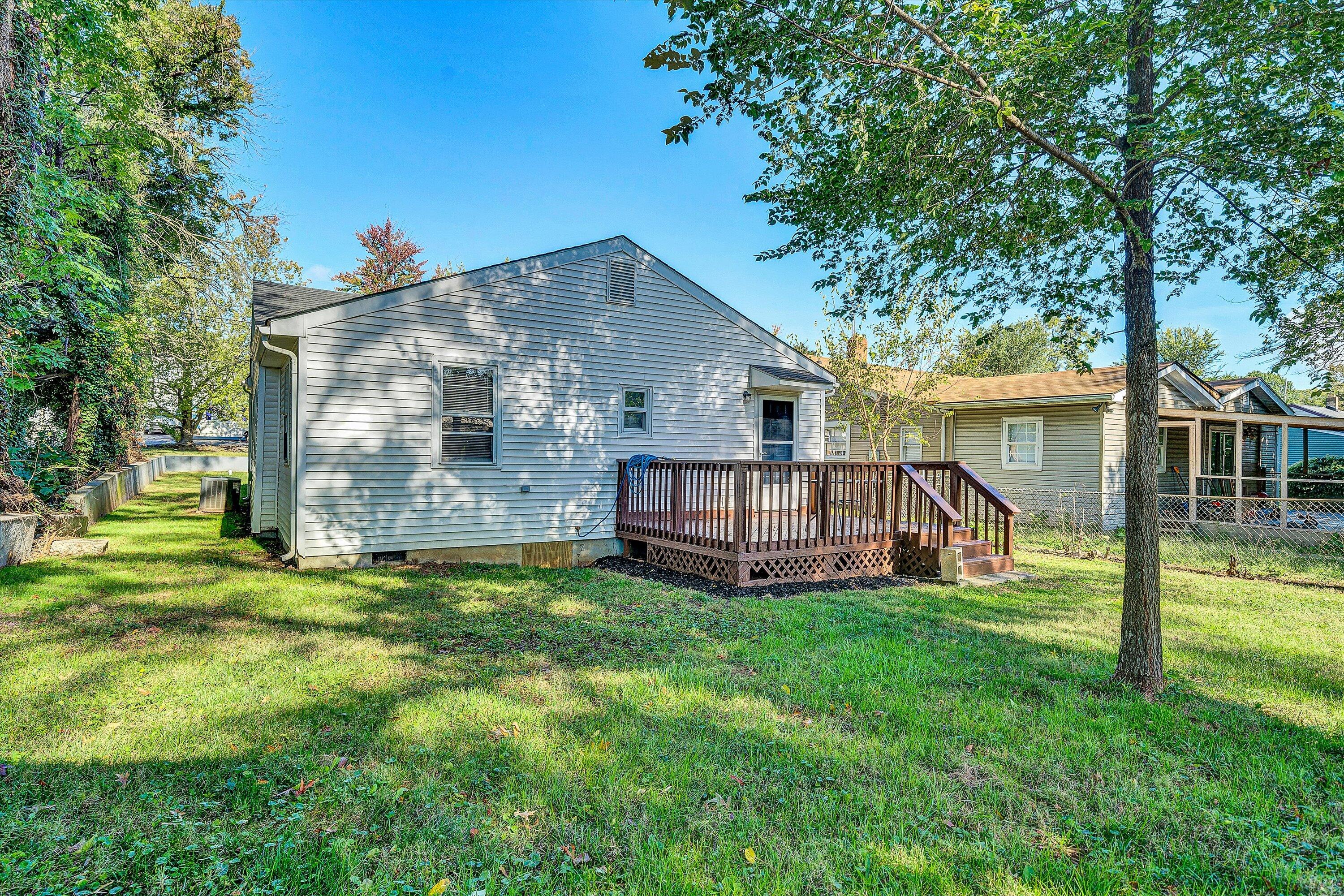 115 Liberty Road Northeast Roanoke, VA 24012 - Photo 23 of 24 a view of a house with a yard and sitting area