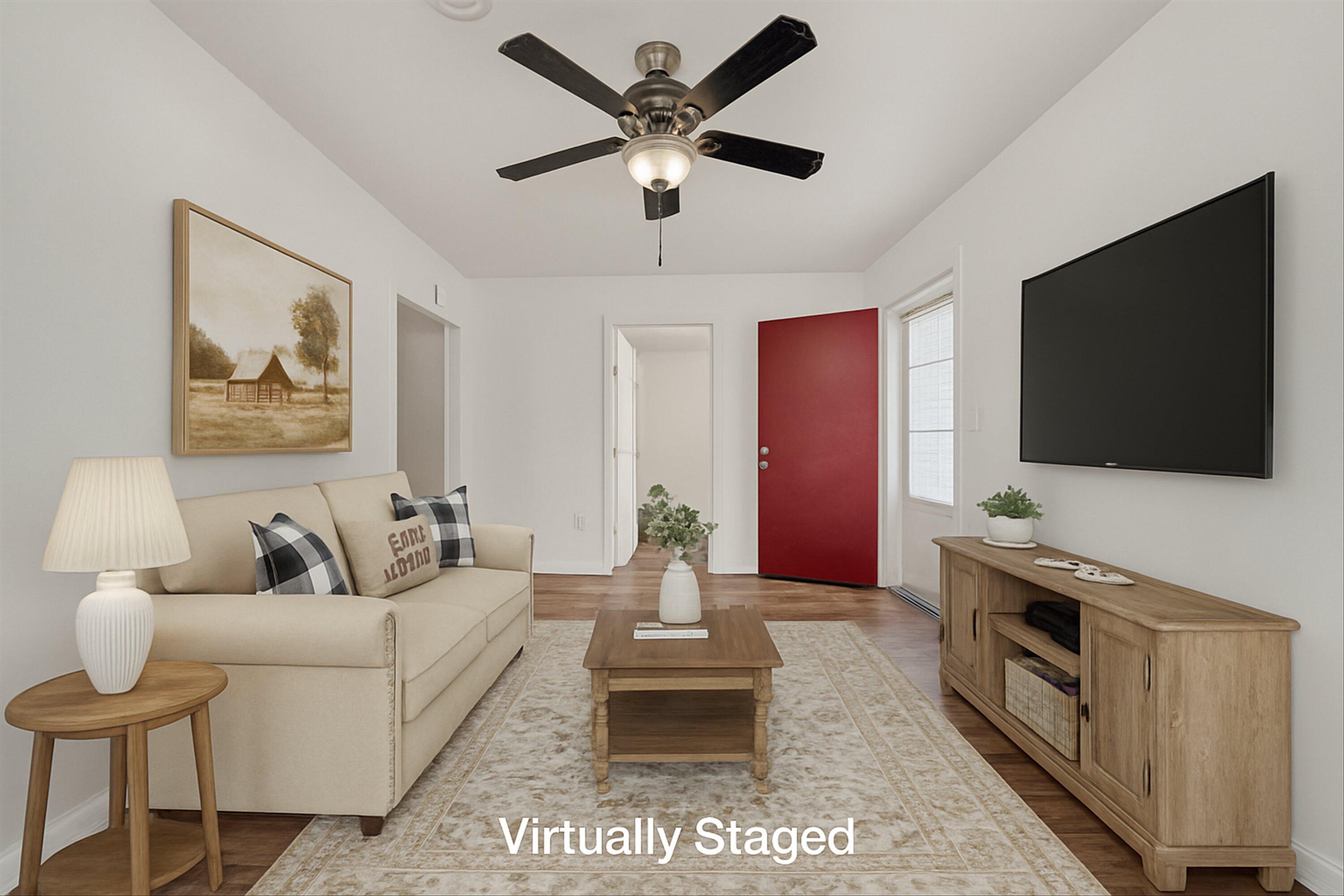 115 Liberty Road Northeast Roanoke, VA 24012 - Photo 3 of 24 a living room with furniture and a flat screen tv