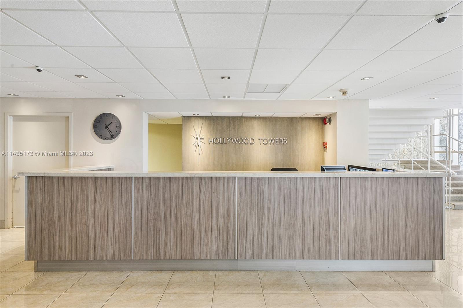 3111 North Ocean Drive, Unit 512 Hollywood, FL 33019 - Photo 23 of 33 a view of an empty room with wooden floor