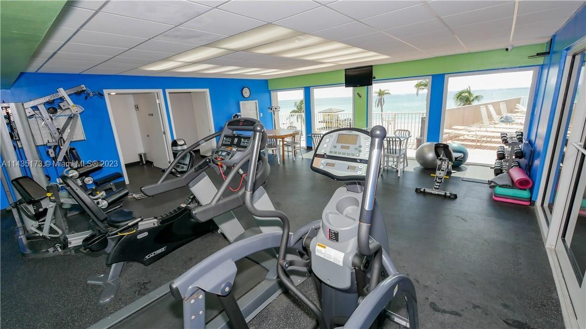 3111 North Ocean Drive, Unit 512 Hollywood, FL 33019 - Photo 32 of 33 a view of a room with gym equipment