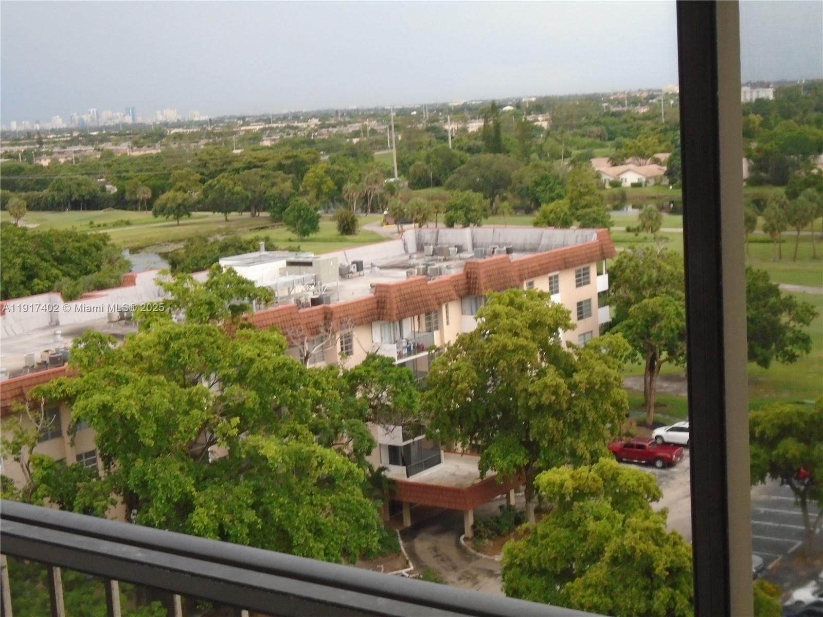 4174 Inverrary Drive, Unit 1004 Lauderhill, FL 33319 - Photo 14 of 53 a view of a city from a balcony