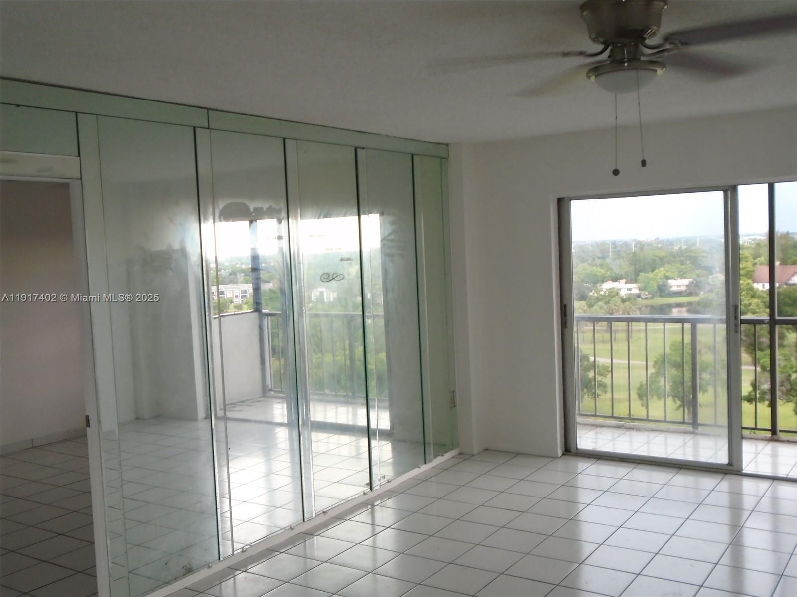 4174 Inverrary Drive, Unit 1004 Lauderhill, FL 33319 - Photo 30 of 53 a view of an empty room and window