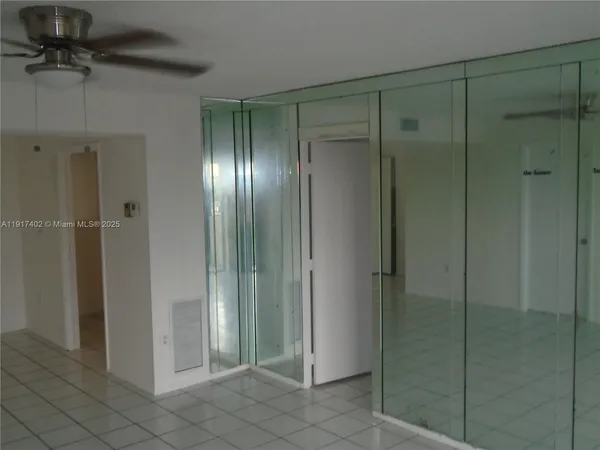 an empty room with windows