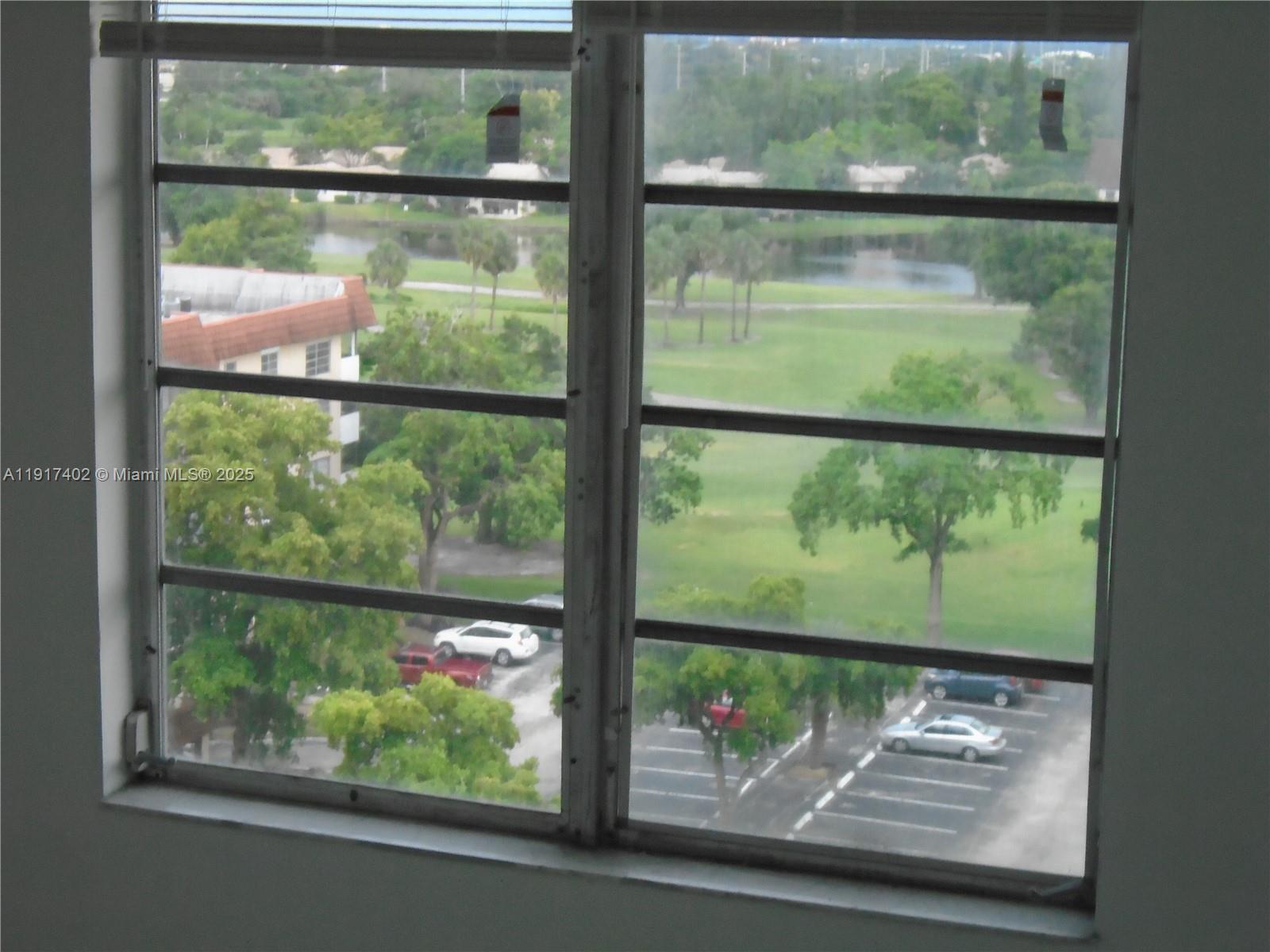 4174 Inverrary Drive, Unit 1004 Lauderhill, FL 33319 - Photo 35 of 53 a view of a back yard from a window