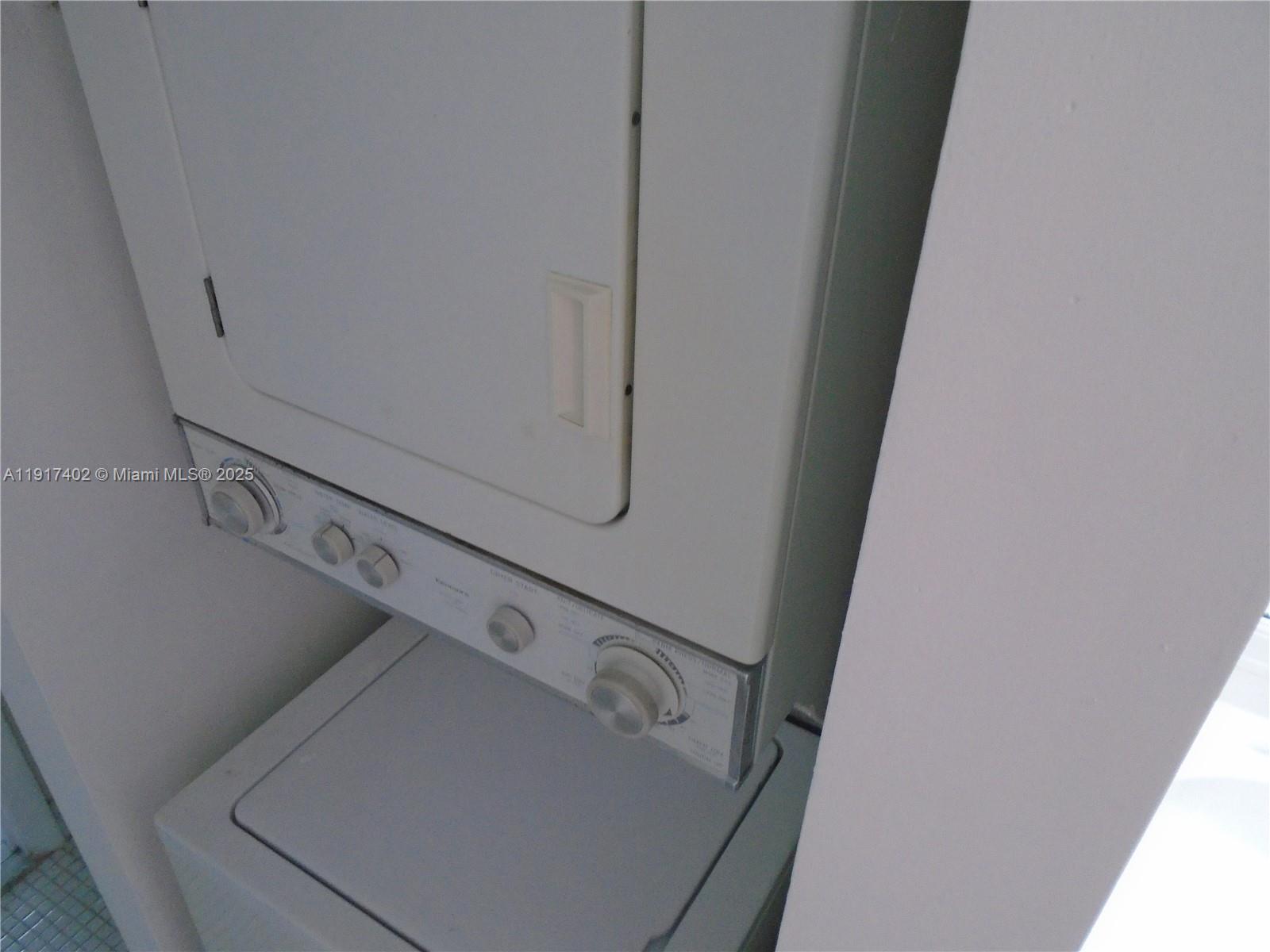 4174 Inverrary Drive, Unit 1004 Lauderhill, FL 33319 - Photo 39 of 53 a utility room with dryer and washer