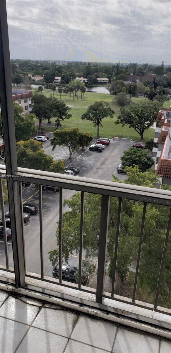 4174 Inverrary Drive, Unit 1004 Lauderhill, FL 33319 - Photo 43 of 53 a view of a balcony with an outdoor space
