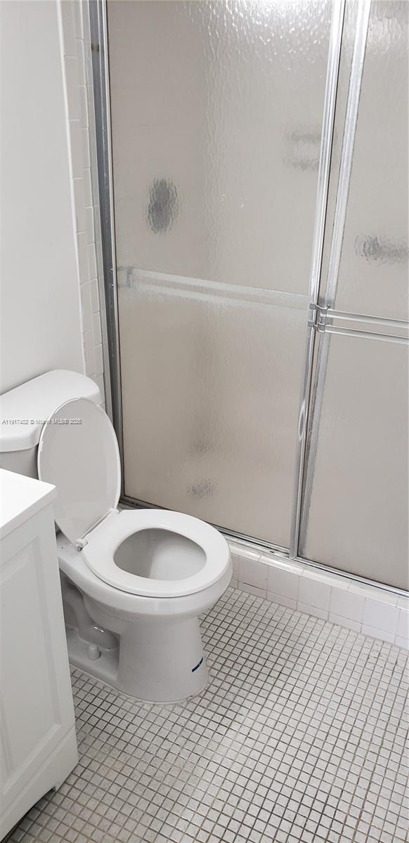 4174 Inverrary Drive, Unit 1004 Lauderhill, FL 33319 - Photo 50 of 53 a bathroom with a toilet and a shower