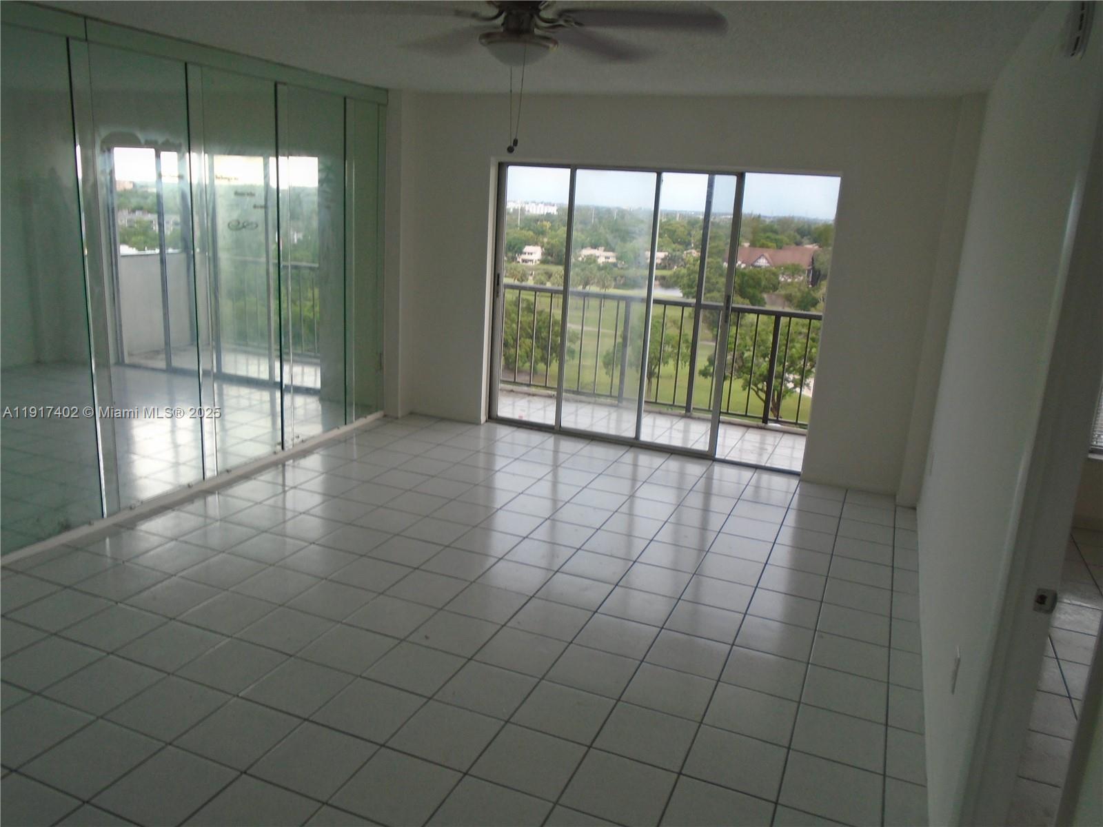 4174 Inverrary Drive, Unit 1004 Lauderhill, FL 33319 - Photo 5 of 53 a view of an empty room and window