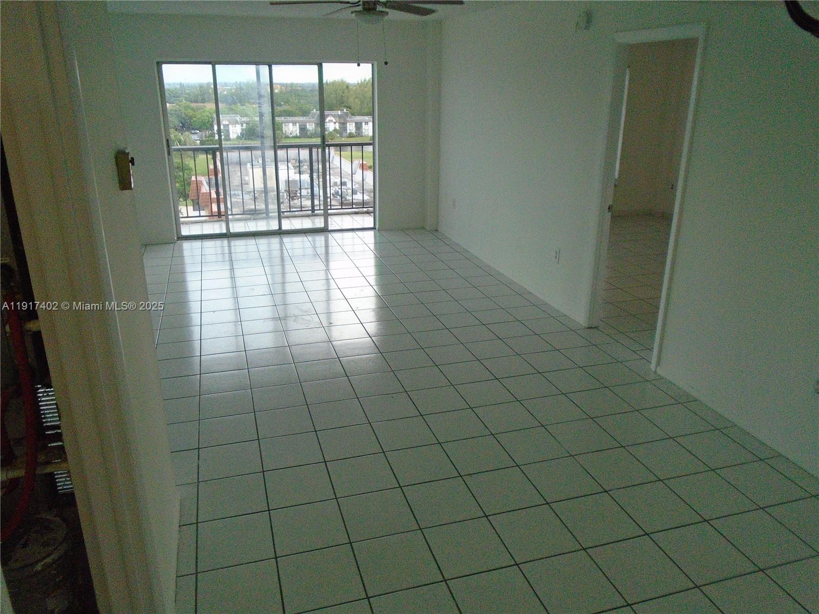 4174 Inverrary Drive, Unit 1004 Lauderhill, FL 33319 - Photo 7 of 53 a view of an empty room and window