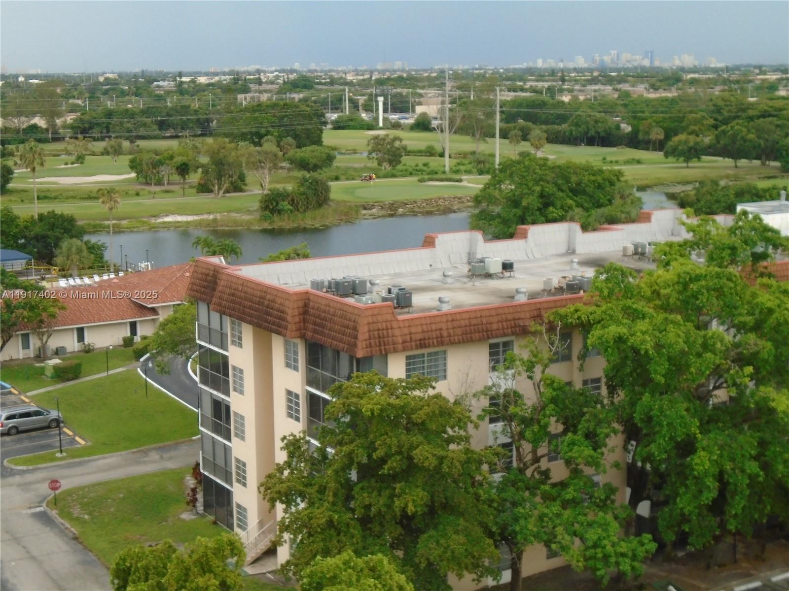 4174 Inverrary Drive, Unit 1004 Lauderhill, FL 33319 - Photo 10 of 53 an aerial view of a house with a yard