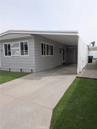 a house view with a backyard space