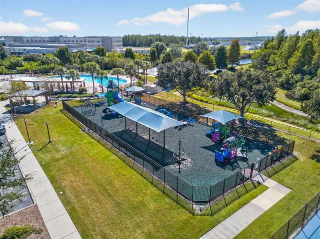 a view of a swimming pool with a lounge chairs